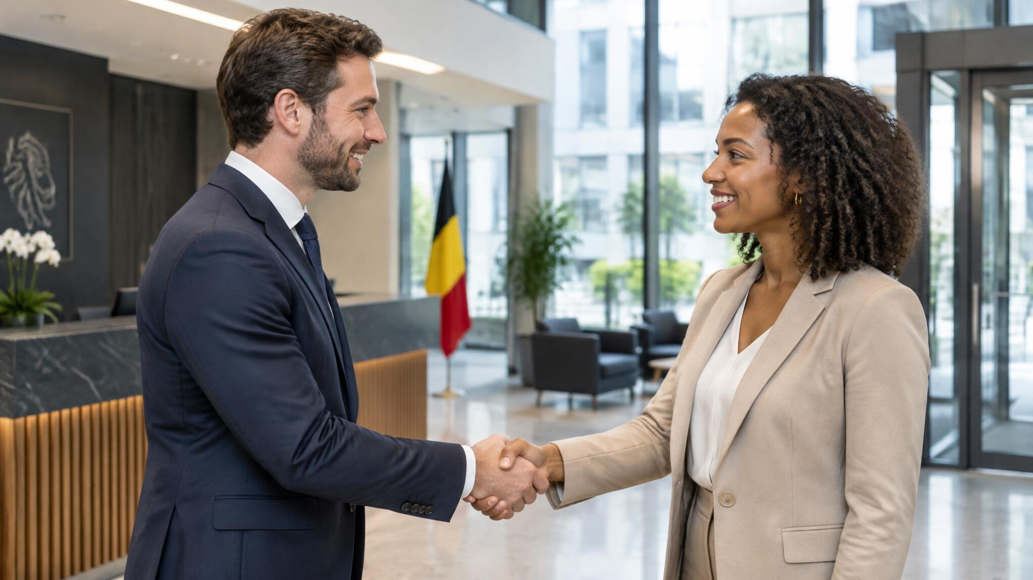 Business services team shaking hands in office